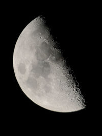 Low angle view of moon against sky at night