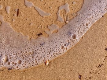 High angle view of sand on beach