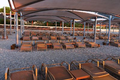 High angle view of empty chairs at table