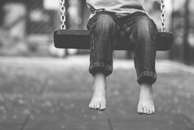Child swinging on a playground
