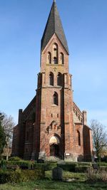 Low angle view of historic building against sky