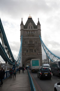 View of bridge against cloudy sky