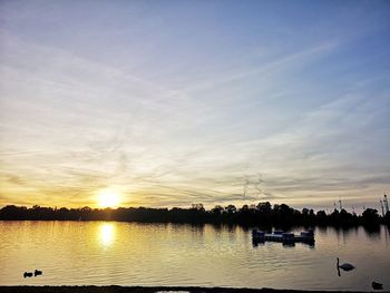 Silhouette of marina at sunset