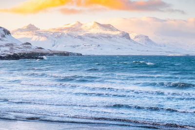 Scenic view of sea against sky during sunset