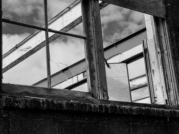 Low angle view of built structure against cloudy sky