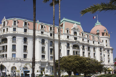 View of buildings against blue sky