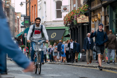 People on street in city