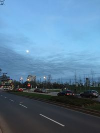 Road in city against sky