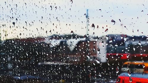 Raindrops on glass window during rainy season