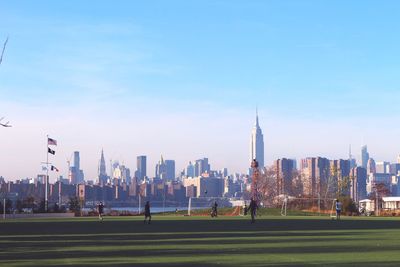 View of city against cloudy sky