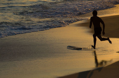 Full length of man on beach