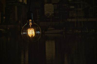 Close-up of illuminated light bulb