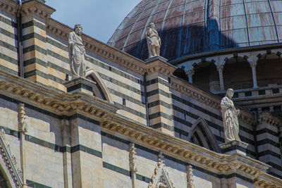 Low angle view of old building against sky