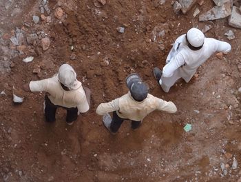 High angle view of people standing at construction site