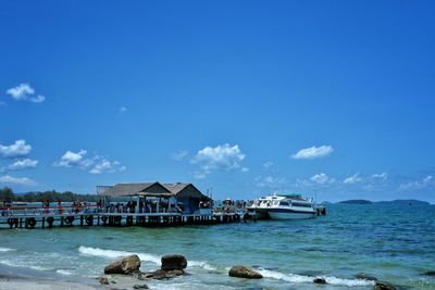 Scenic view of sea against blue sky