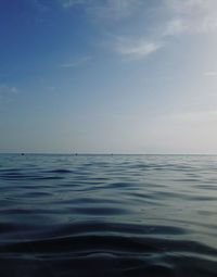 Scenic view of sea against blue sky