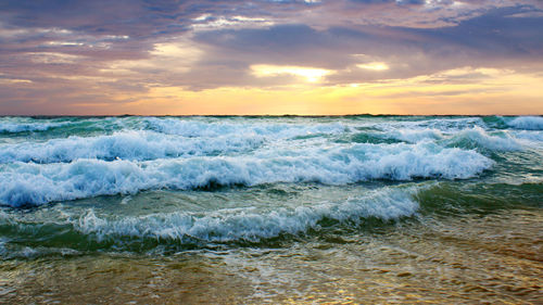 Scenic view of sea against sky during sunset