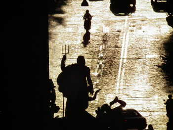 Silhouette man in water