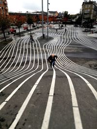 High angle view of man running on road