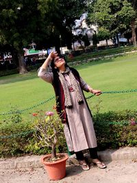 Woman standing in park