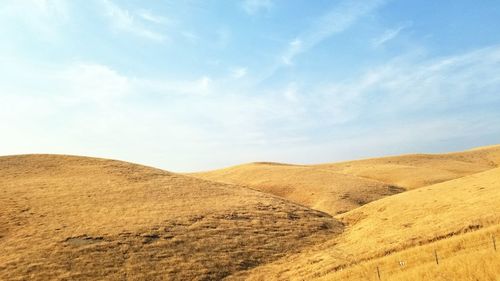Scenic view of desert against sky