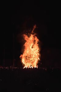 Bonfire against sky at night