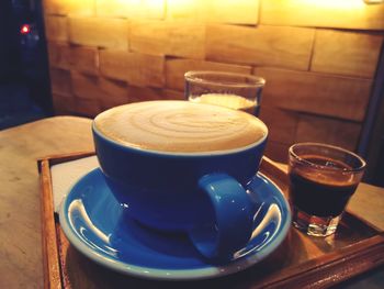 Close-up of coffee cup on table