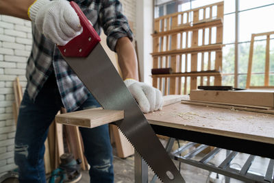 Man working on table at home