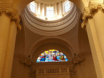 A stained glass window of a catholic church - gozo island malta