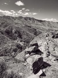 Scenic view of landscape and mountains against sky