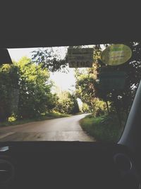 Road seen through car windshield