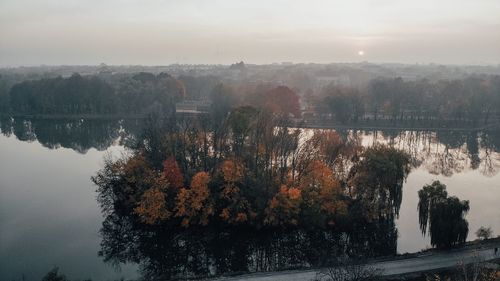 Scenic view of lake against sky during autumn