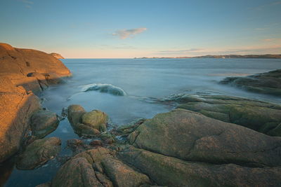 Scenic view of sea against sky during sunset