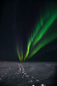 Scenic view of sea against sky at night