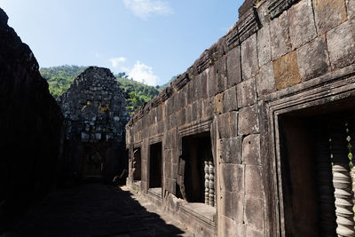 View of old ruin building against sky