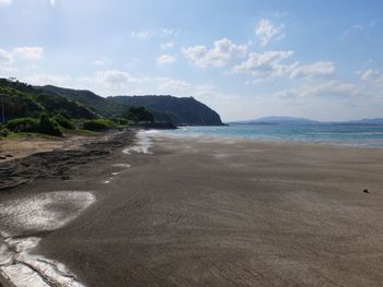 Scenic view of beach against sky