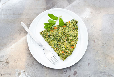 High angle view of salad in plate on table