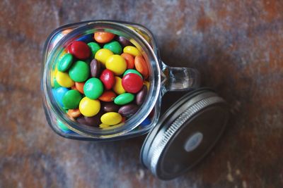 Close-up of multi colored candies on table