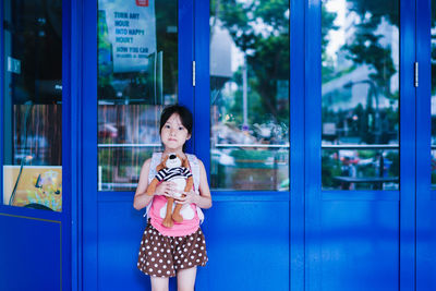 Portrait of woman photographing