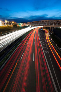 High angle view of light trails on road