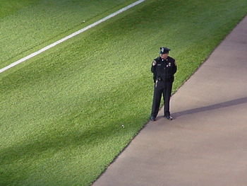 Full length of woman standing by railing