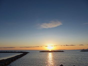 Scenic view of sea against sky during sunset