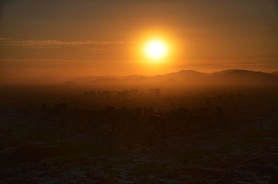 Scenic view of silhouette landscape against sky during sunset