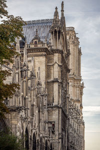 Architectural side above the secondary entrance of notre dame de paris cathedral