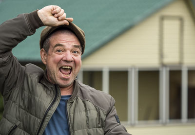 Portrait of man wearing hat outdoors