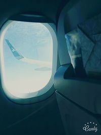 Low angle view of airplane window