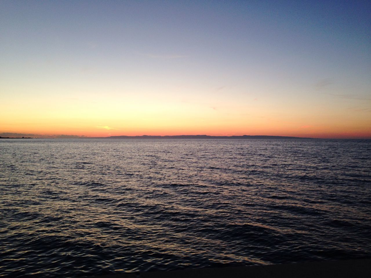 sunset, sea, water, scenics, tranquil scene, beauty in nature, tranquility, orange color, waterfront, copy space, horizon over water, nature, idyllic, clear sky, rippled, sky, seascape, dusk, outdoors, remote