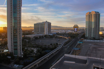 High angle view of buildings against sky during sunset