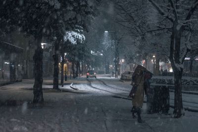 People walking on road in winter