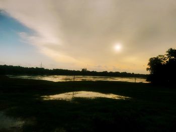 Scenic view of landscape against sky during sunset